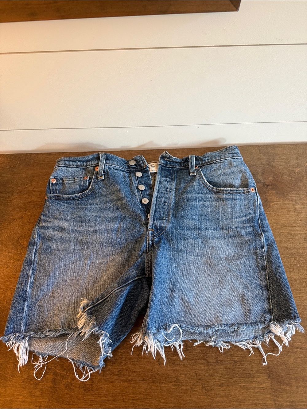Levi's Medium Blue Frayed Hem Button-Fly Jean Shorts